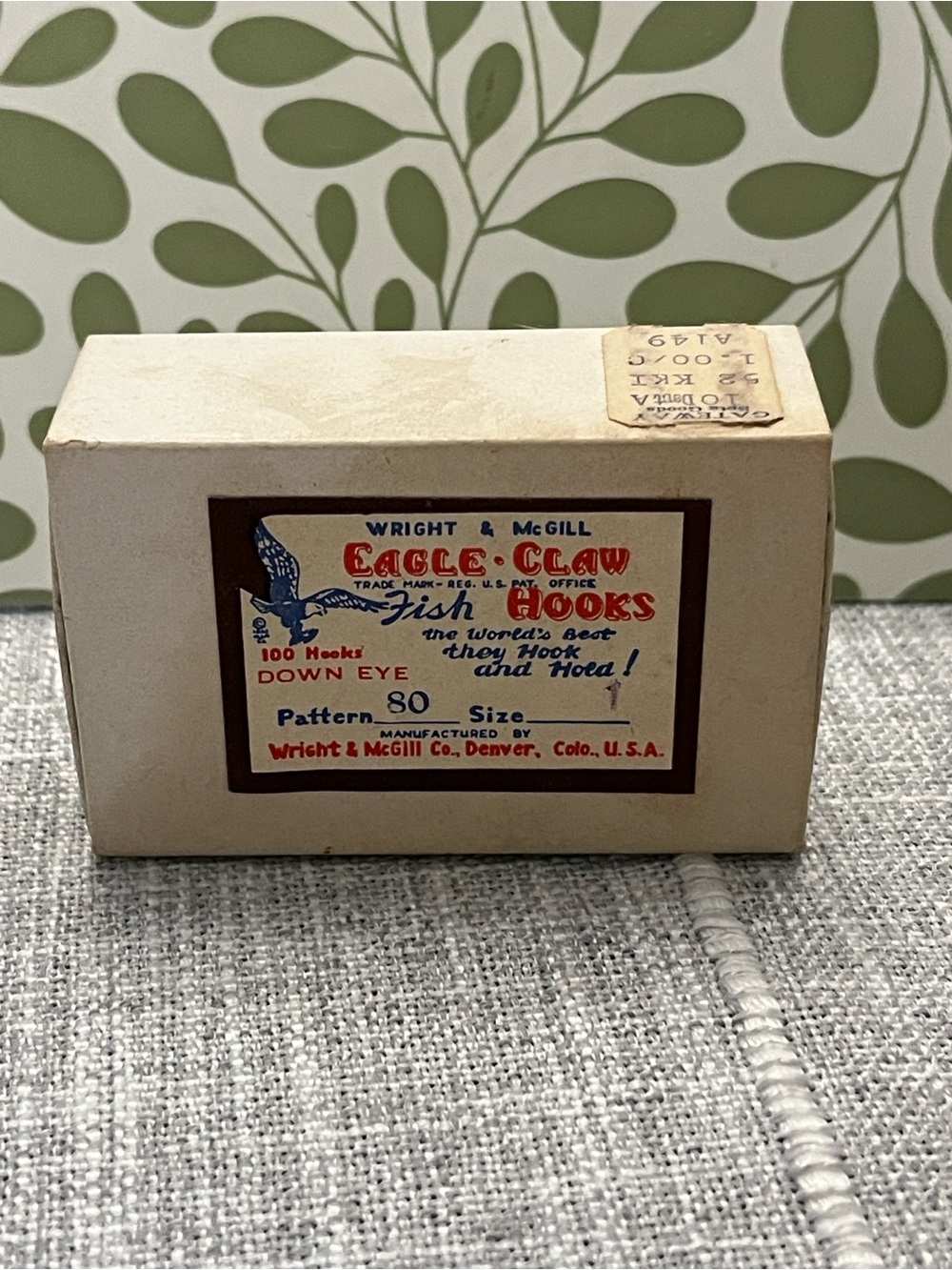 Vintage Wright & McGill Eagle Claw fish-hook box, likely dating from the 1940’s